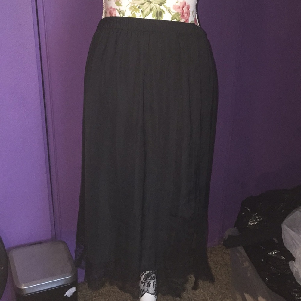 Black skirt with lace trimming on the bottom